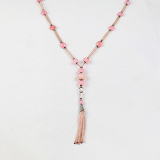 Pink stone cut into beads and weaved into a beautiful necklace for your loved one.